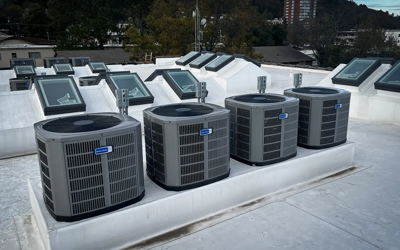 4 rooftop American Standard HVAC units installed by Goza Construction.