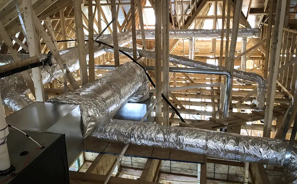 HVAC ductwork installed into the attic of this new construction.